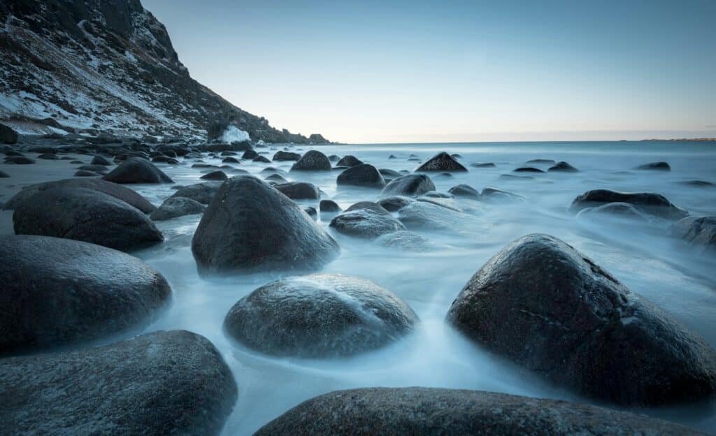 Smooth rocks in flow of water